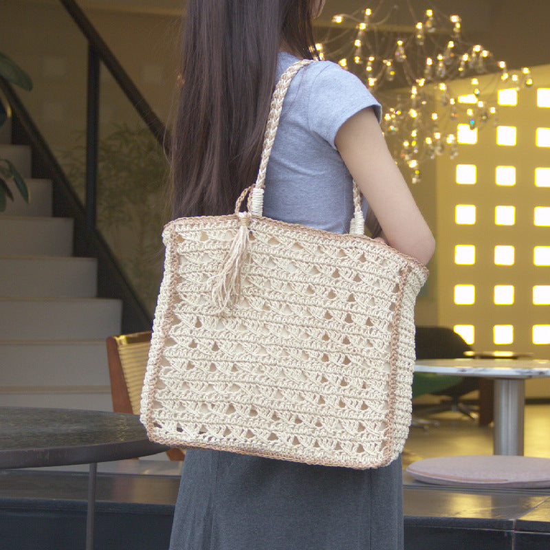 Square tassel single shoulder grass woven bag small fresh hollow handmade grass woven bag women&