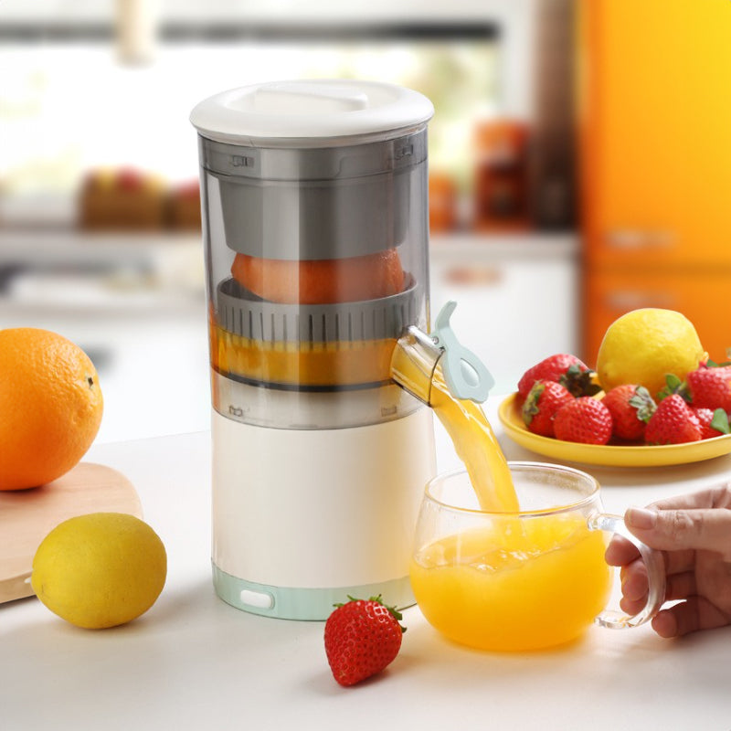 Portable USB - rechargeable slow juicer for oranges, lemons &amp; other fruits. A handy electric blender for home kitchens.