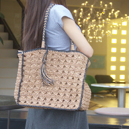 Square tassel single shoulder grass woven bag small fresh hollow handmade grass woven bag women&