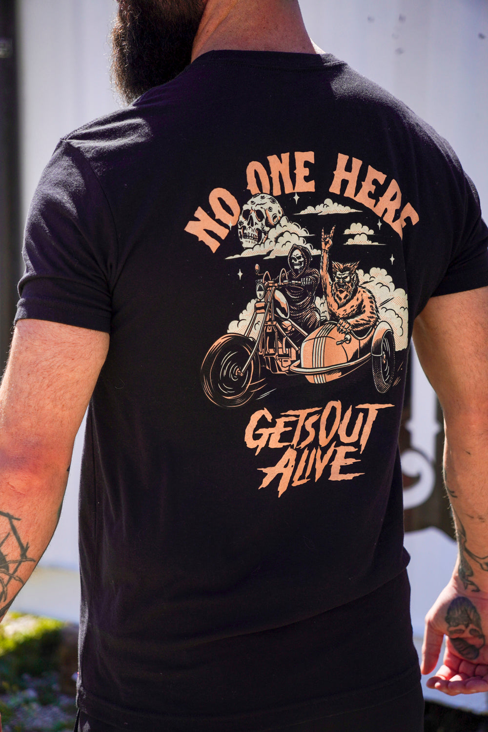 No One Gets Out Tee