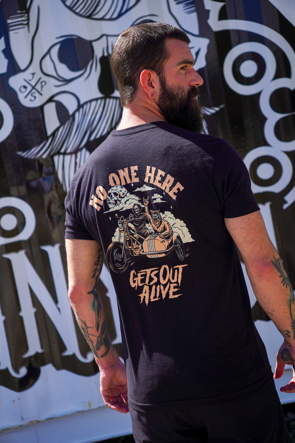 No One Gets Out Tee